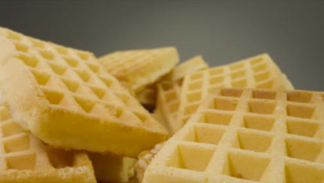 Sliding-Extreme-Close-Up-Shot-of-a-Pile-of-Waffles
