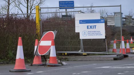 Wide-Shot-of-COVID-19-Testing-Site-Exit-Sign-