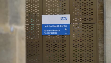 Handheld-Long-Shot-of-Jericho-Health-Centre-Sign-In-Oxford-