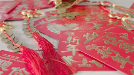 Sliding-Shot-of-Pile-of-Chinese-New-Year-Red-Envelopes