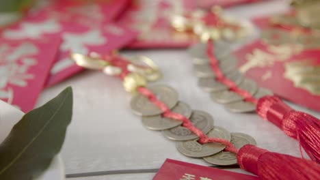 Sliding-Close-Up-Shot-of-a-Pile-of-Chinese-New-Year-Red-Envelopes