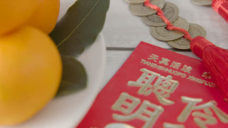 Sliding-Close-Up-Shot-of-a-Pile-of-Chinese-New-Year-Red-Pockets