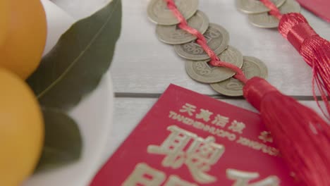 Sliding-Close-Up-Shot-of-a-Pile-of-Chinese-New-Year-Red-Pockets