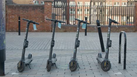 Medium-Shot-of-Stationary-Electric-Scooters