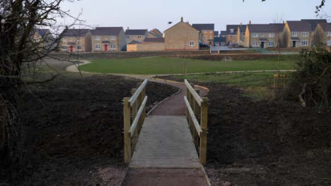Wide-Shot-of-Footpath-Bridge-Leading-to-New-Housing-Area