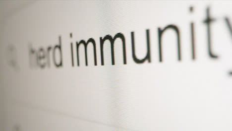 Extreme-Close-Up-Typing-Herd-Immunity-in-Google-Search-Bar