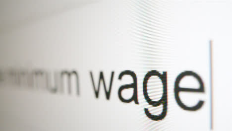 Extreme-Close-Up-Typing-What-is-Minimum-Wage-in-Google-Search-Bar