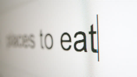 Extreme-Close-Up-Typing-Places-to-Eat-in-Google-Search-Bar