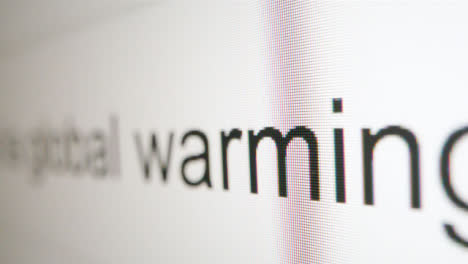 Extreme-Close-Up-Typing-What-is-Global-Warming-in-Google-Search-Bar