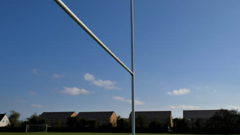 Tracking-Low-Angle-Shot-Looking-Up-at-Rugby-Posts