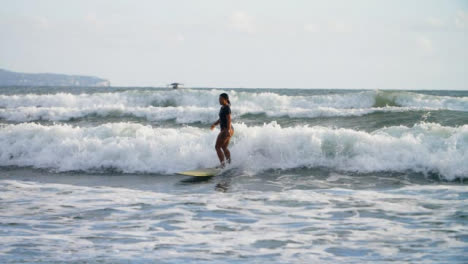 Handheld-Wide-Shot-Tracking-Surfer-Riding-Wave
