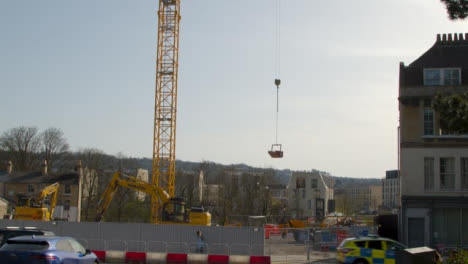 Tilting-Shot-of-Crane-at-Construction-Site