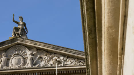 Panning-Shot-of-Apollo-Statue-On-Roof-of-Ashmolean-Museum-