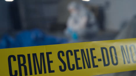 Pull-Focus-Shot-from-Crime-Scene-Tape-to-Forensic