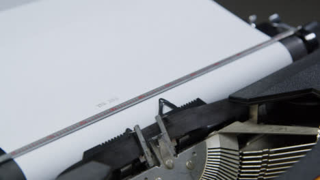 Tracking-Shot-from-Typewriter-Keytop-to-Page-as-Writer-Types-The-End