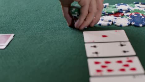 Tracking-Close-Up-Approaching-Community-Cards-as-Poker-Player-Goes-All-In