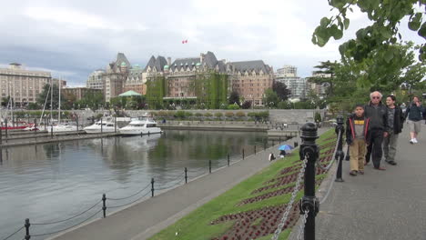 British-Columbia-Victoria-harbor-with-tourists-on-walk