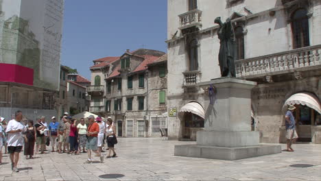 Split-Croatia-people-stroll-in-a-plaza