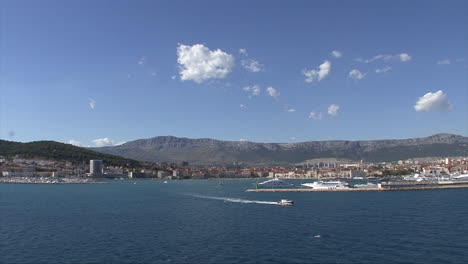 Split-Croatia-small-boat-leaves-harbor