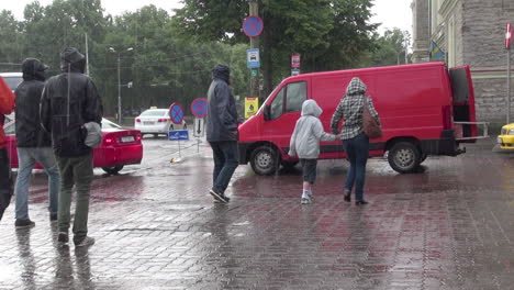 Tallinn-Estonia-family-walking-in-the-rain