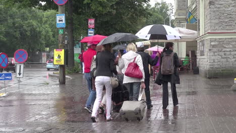 Tallinn-Estonia-people-with-umbrellas-in-rain
