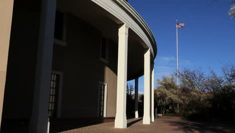 Santa-Fe-New-Mexico-statehouse-with-flag