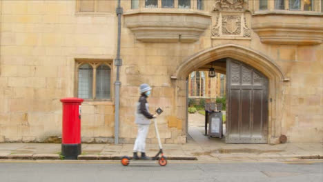 Tracking-Shot-of-Pedestrians-Walking-Outside-English-University