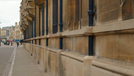 Sliding-Long-Shot-Revealing-Busy-Street-Past-Gonville-and-Caius-College