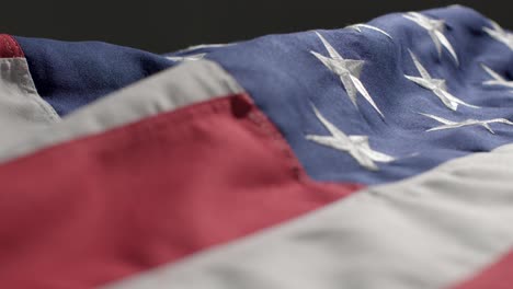 Tracking-Close-Up-Shot-Passing-Over-United-States-Flag