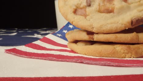 Sliding-Shot-Along-United-States-of-America-Flag-Past-Cookies-and-Glass-of-Milk