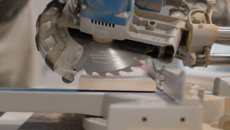 Close-Up-Shot-of-Circular-Saw-Being-Lined-Up-On-Skirting-Board