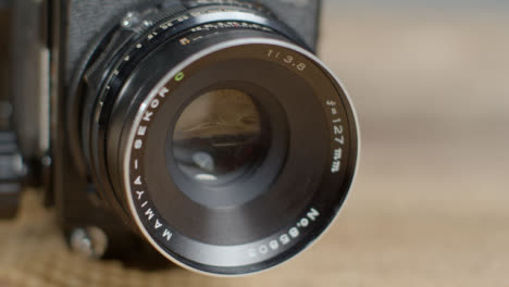 Sliding-Shot-Revealing-127mm-Lens-On-Mamiya-RB67-Medium-Format-Film-Camera