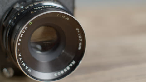 Sliding-Shot-Revealing-127mm-Lens-On-a-Mamiya-RB67-Medium-Format-Film-Camera