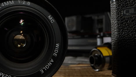 Sliding-Shot-Past-Retro-Cameras-and-Lenses