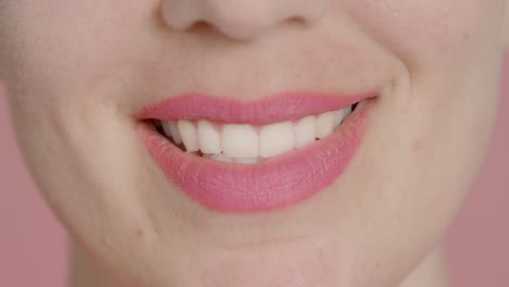 Extreme-Close-Up-Shot-of-Female-Model's-Mouth-Smiling