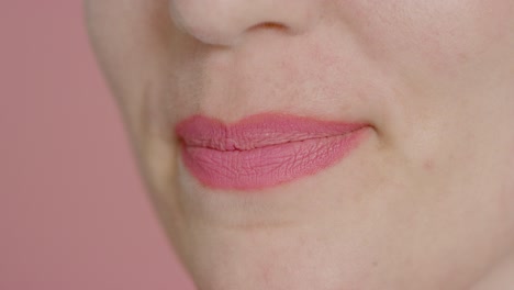 Extreme-Close-Up-Shot-of-Female-Model's-Lips-Smiling