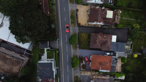 Drone-Shot-Looking-Down-and-Passing-Over-Road