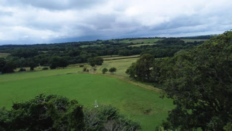 Drone-Shot-Flying-Over-Trees-and-Countryside-Hills-Part-1-of-2