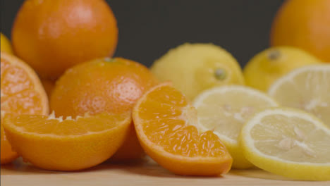 Sliding-Shot-Approaching-Pile-of-Citrus-Fruit-