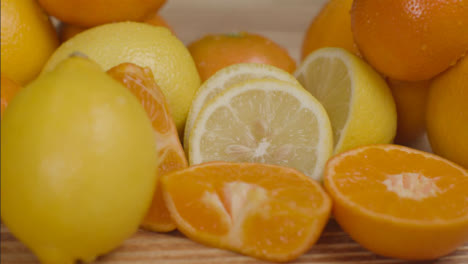 Sliding-Shot-Over-Pile-of-Citrus-Fruit-