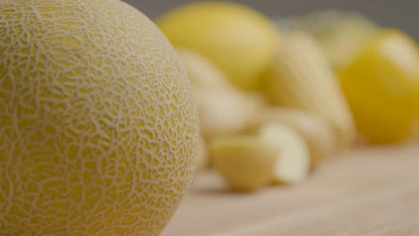 Close-Up-Shot-of-Melon-On-Rustic-Wood-Table