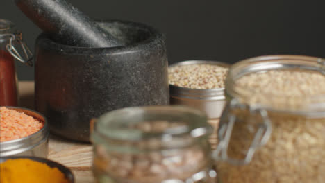 Tracking-Out-Shot-from-Mortar-and-Pestle-to-Spices-on-Table