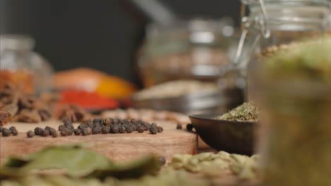 Pull-focus-of-Herbs-and-Spices-on-Table