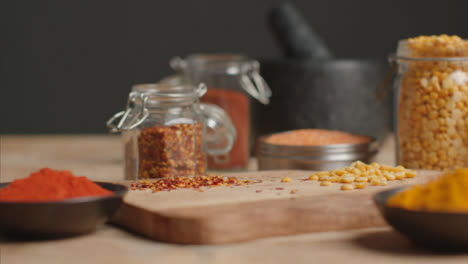 Sliding-In-Shot-of-Spices-on-Table
