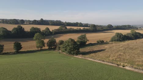 Drone-Shot-Flying-Over-Some-Rural-Countryside-Fields