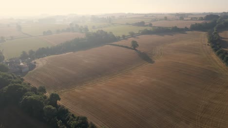 Drone-Shot-Rising-Above-Rural-Fields