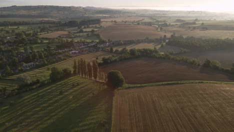 Drone-Shot-Flying-Over-Some-Rural-Fields