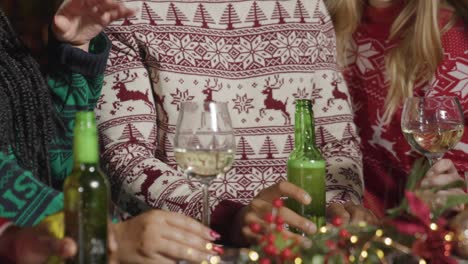 Close-Up-of-Friends-Celebrating-Christmas-at-Bar