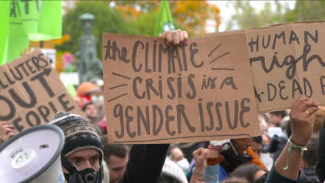Protester-Holding-Climate-Change-Sign-at-COP-26-Protest