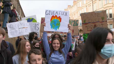 Young-Activists-Holding-Signs-atCOP26-Climate-Change-Protest